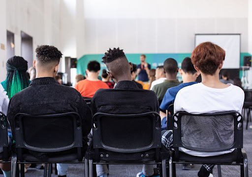 Young students listening to a presentation