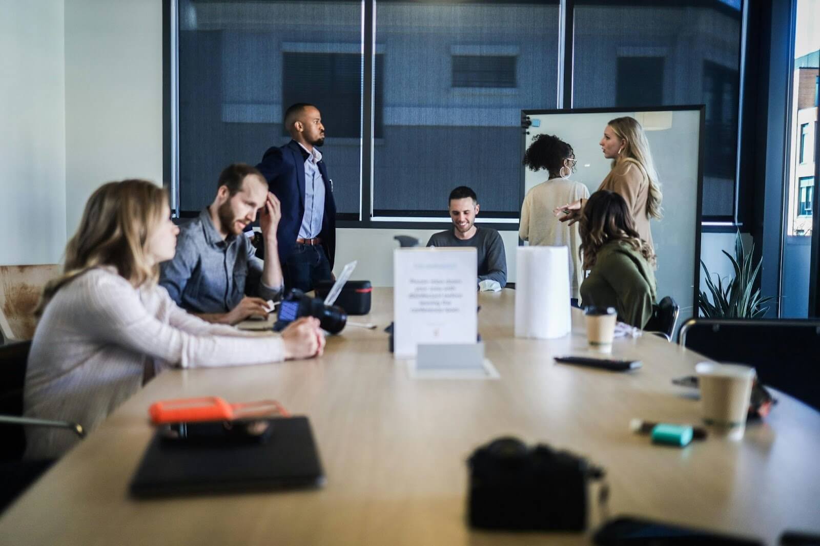 Group of coworkers collaborating in a meeting room